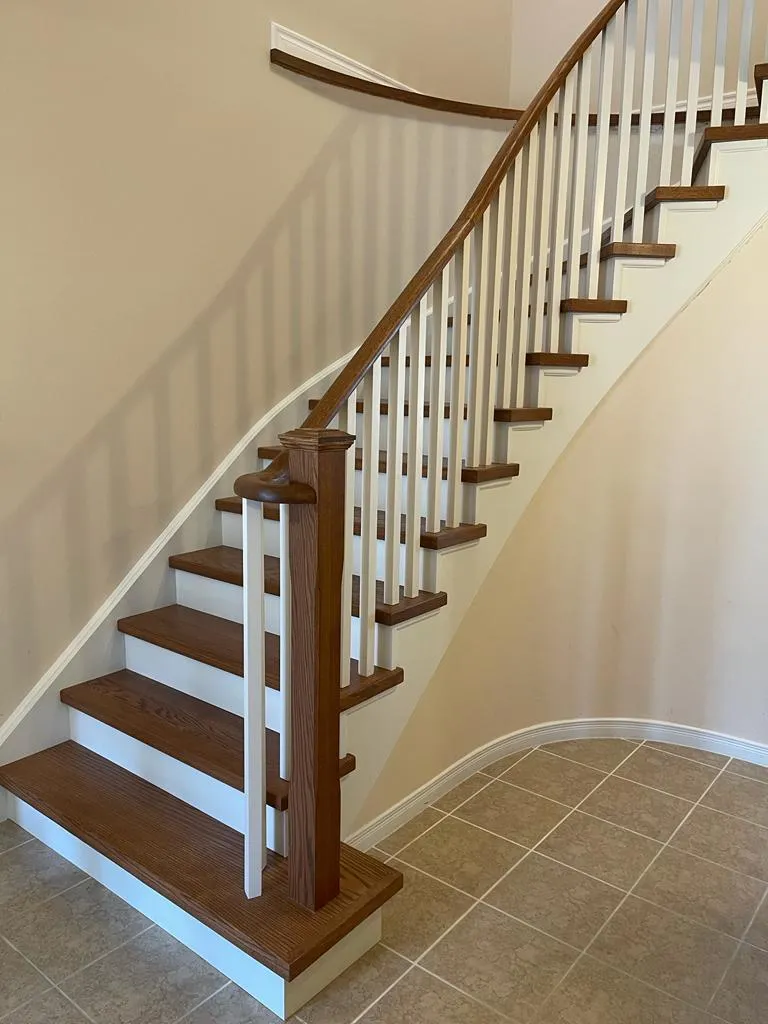 curved staircase capped with hardwood from Stairsteps