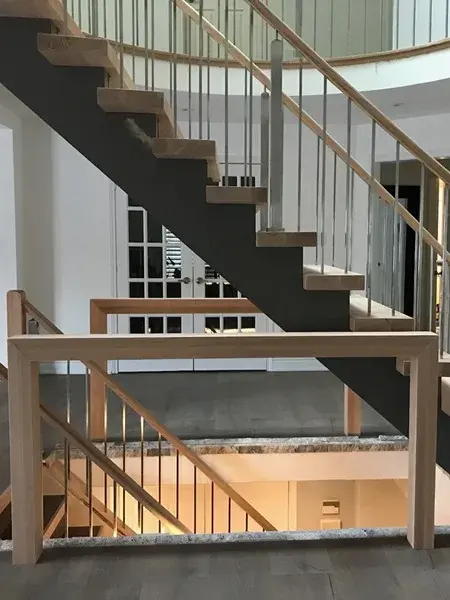 Open risers stairs with custom solid Oak guards Open risers stairs with custom solid Oak guards