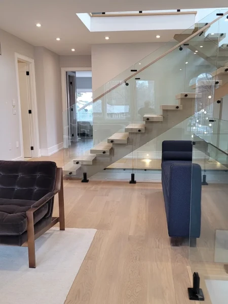 Modern glass railing remodel with light Oak theme 