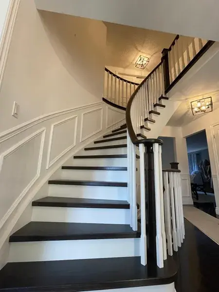 Hardwood staircase renovation with stair tread capping