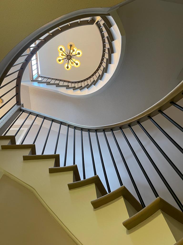 Staircase Renovation in Bolton - Refinishing Staircase renovation in Bolton featuring professional staining and low-VOC painting
