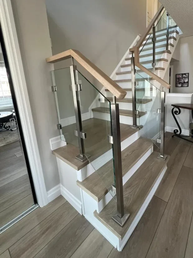 Glass staircase renovation with stainless steel