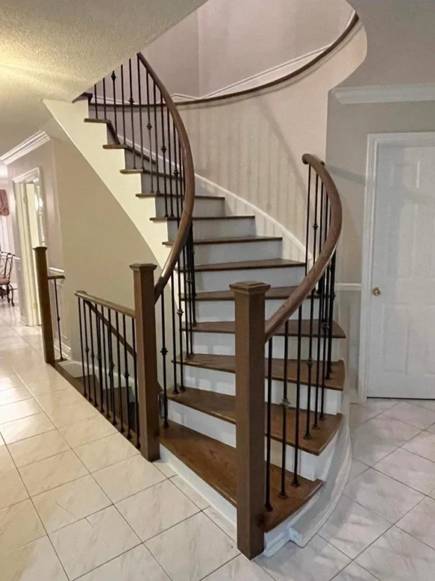 Beautiful stair remodel with metal spindles